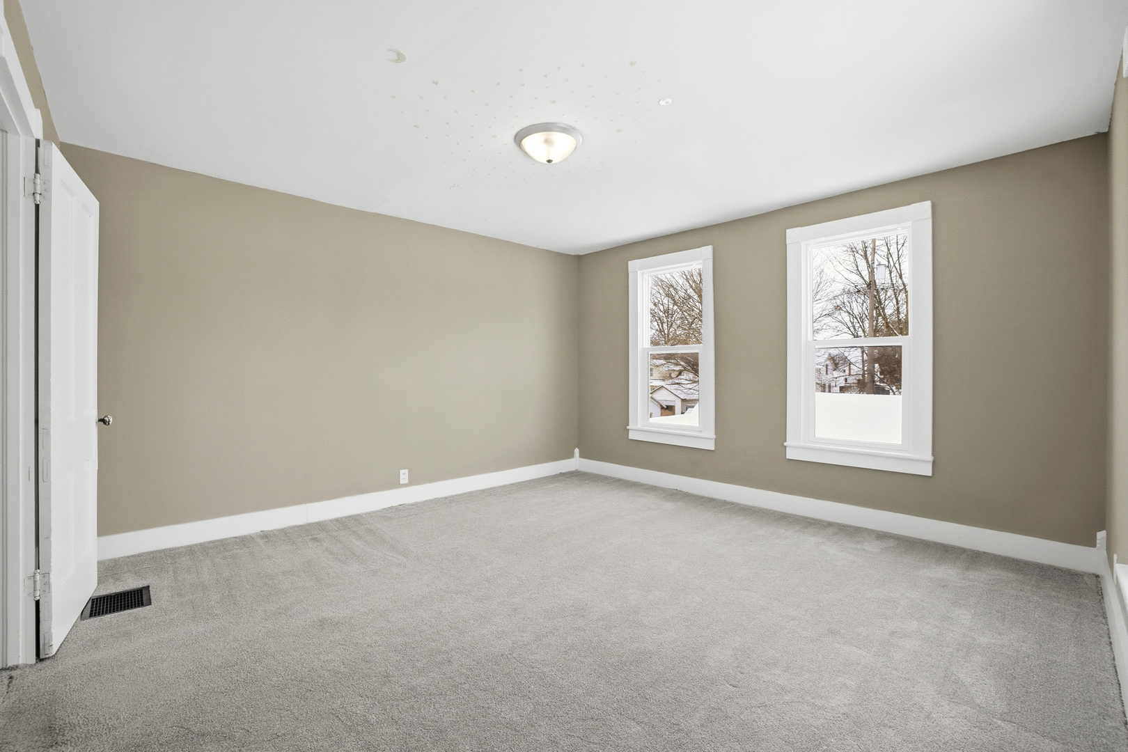406 West Balsam Street Forreston, IL 61030 - Photo 23 of 36 a view of an empty room with a window