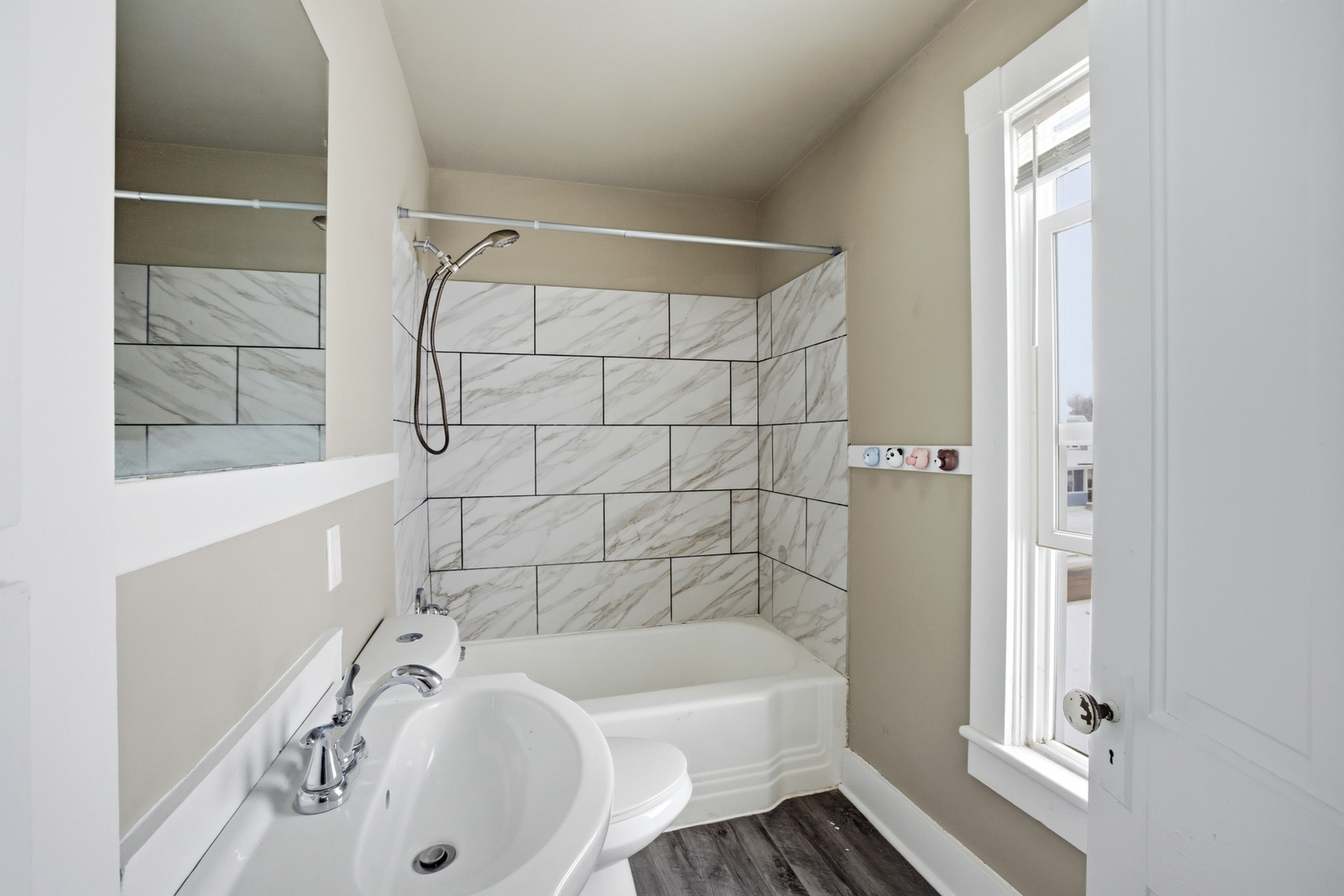 406 West Balsam Street Forreston, IL 61030 - Photo 32 of 36 a bathroom with a bathtub and a shower
