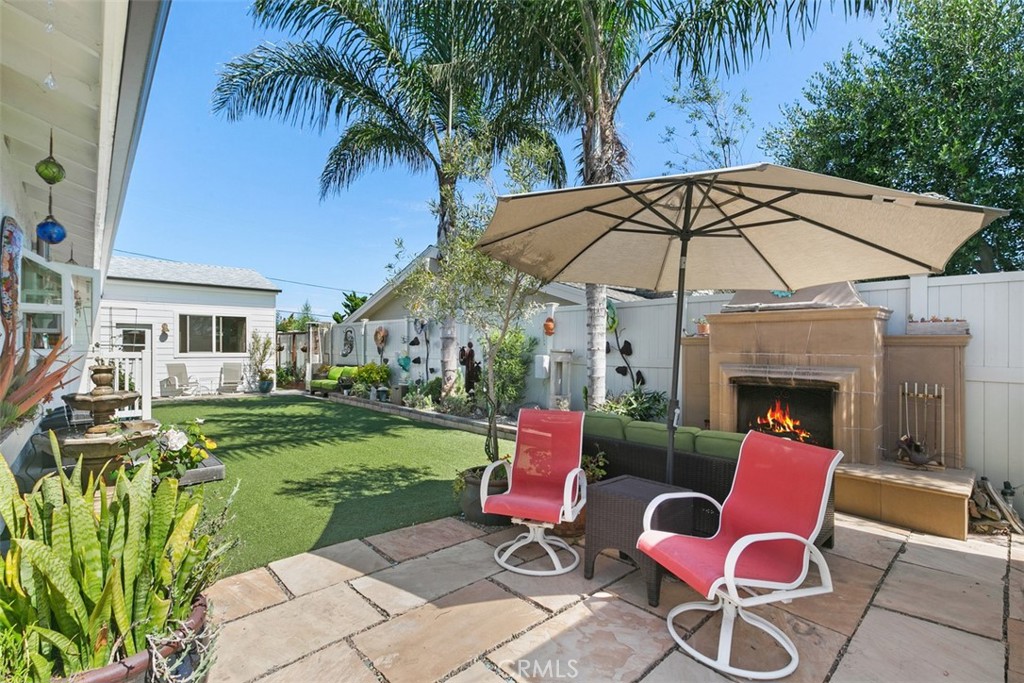24272 Selva Road Dana Point, CA 92629 - Photo 12 of 39 a backyard of a house with seating space