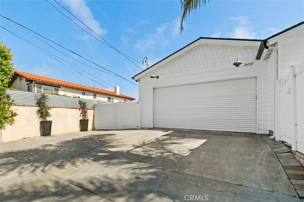 24272 Selva Road Dana Point, CA 92629 - Photo 34 of 39 a view of a house with a garage
