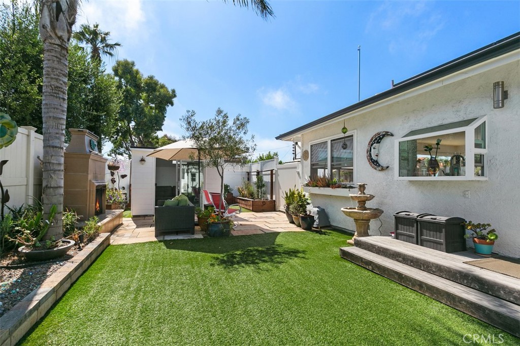 24272 Selva Road Dana Point, CA 92629 - Photo 8 of 39 a view of a house with backyard and sitting area