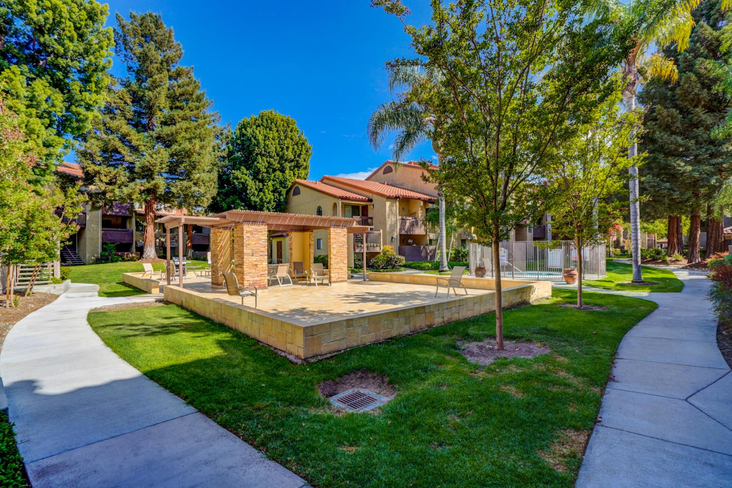 2250 Monroe Street, Unit 192 Santa Clara, CA 95050 - Photo 11 of 33 a front view of a house with garden and trees