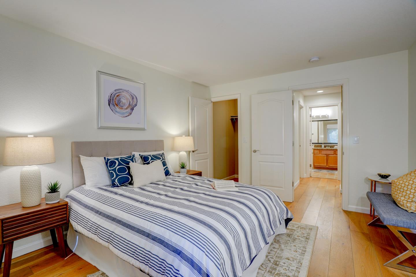 2250 Monroe Street, Unit 192 Santa Clara, CA 95050 - Photo 24 of 33 a bedroom with a bed and wooden floor
