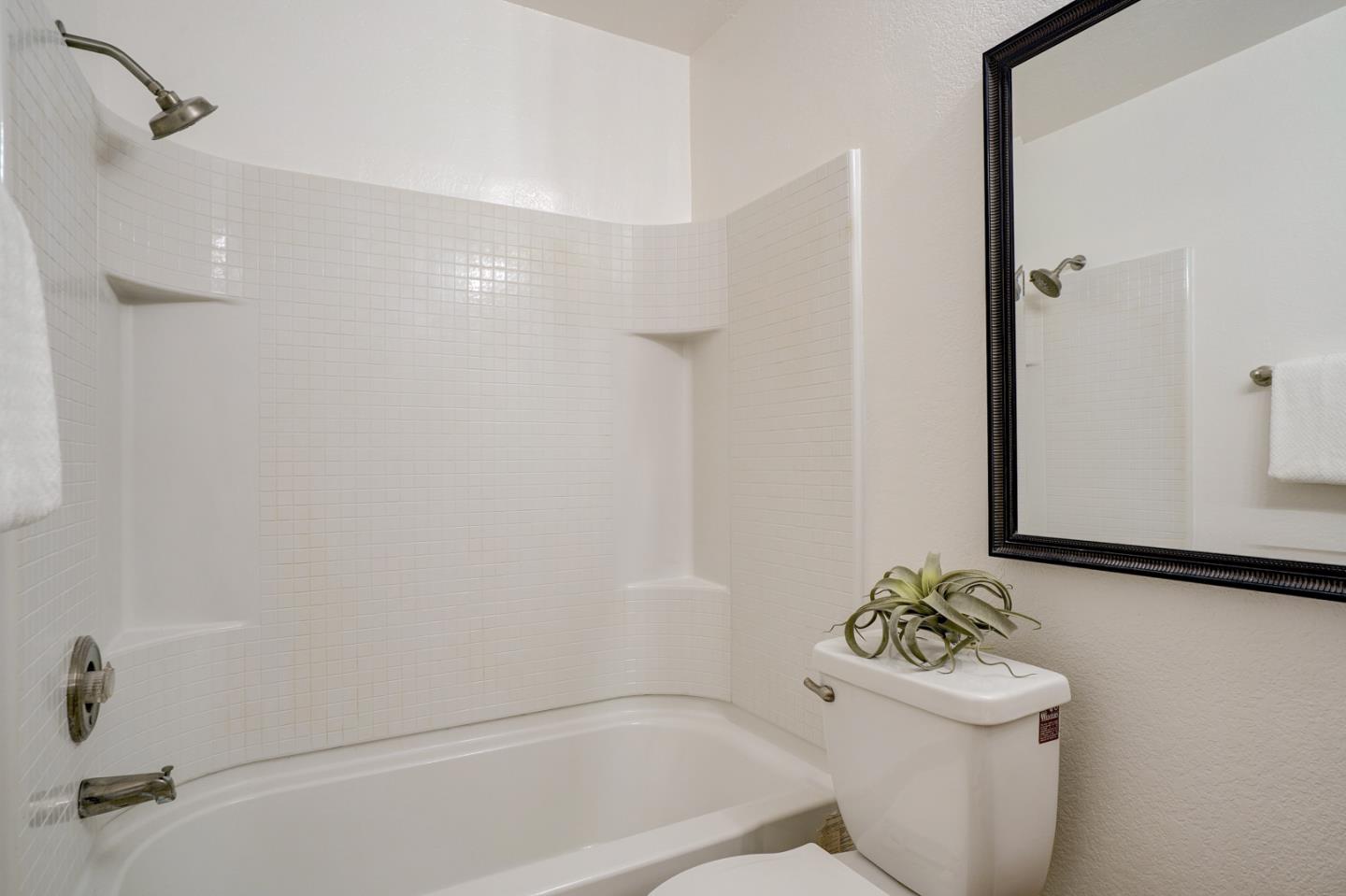 2250 Monroe Street, Unit 192 Santa Clara, CA 95050 - Photo 26 of 33 a bathroom with a bathtub and a shower