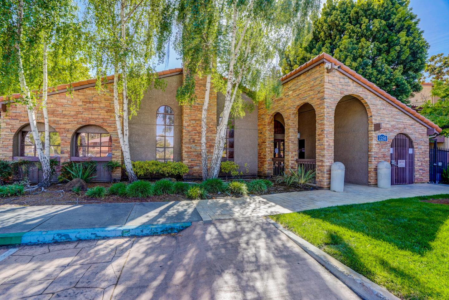 2250 Monroe Street, Unit 192 Santa Clara, CA 95050 - Photo 5 of 33 a front view of a house with yard and green space