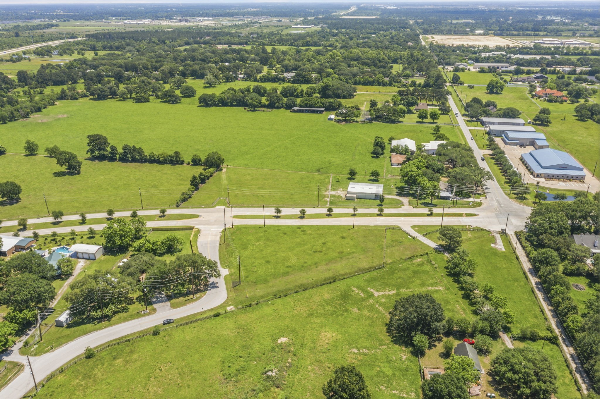 0 Mueschke Road Tomball, TX 77377 - Photo 40 of 44 an aerial view of residential houses with outdoor space and lake view