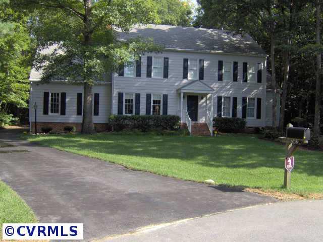 2612 Olde Stone Road Midlothian, VA 23113 - Photo 2 of 10 a front view of a house with garden