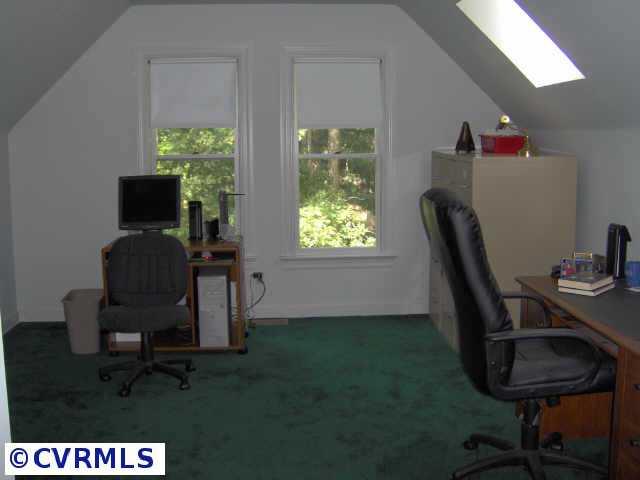 2612 Olde Stone Road Midlothian, VA 23113 - Photo 7 of 10 a view of a workspace with furniture and a window