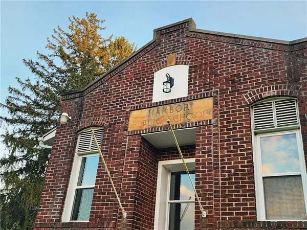 a sign on the side of a building