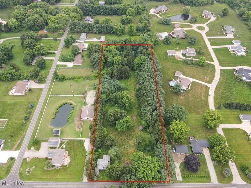 1811 Randolph Road Mogadore, OH 44260 - Photo 2 of 17 Aerial view of property and surrounding area with property parcel outlined
