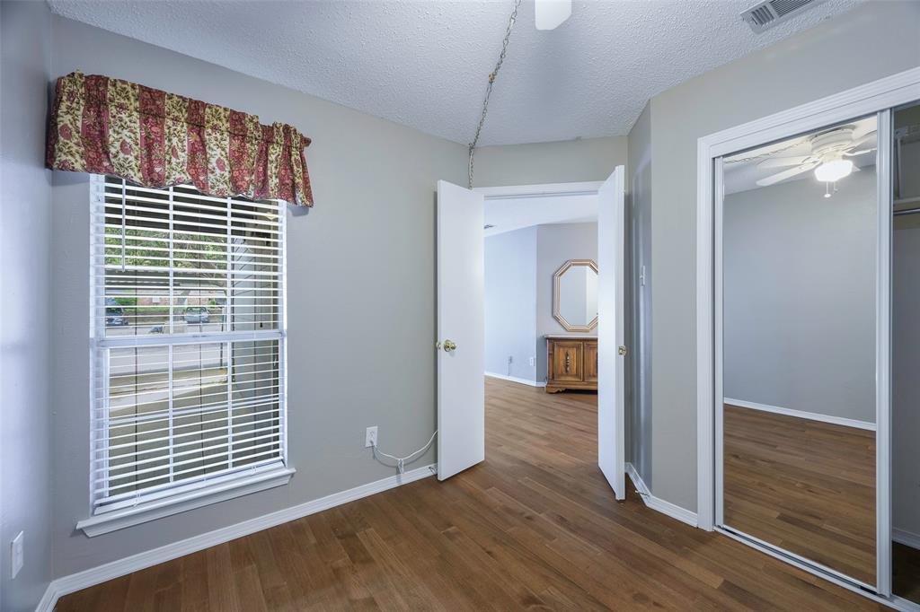 18333 Roehampton Drive, Unit 1412 Dallas, TX 75252 - Photo 7 of 14 a view of livingroom with furniture and wooden floor