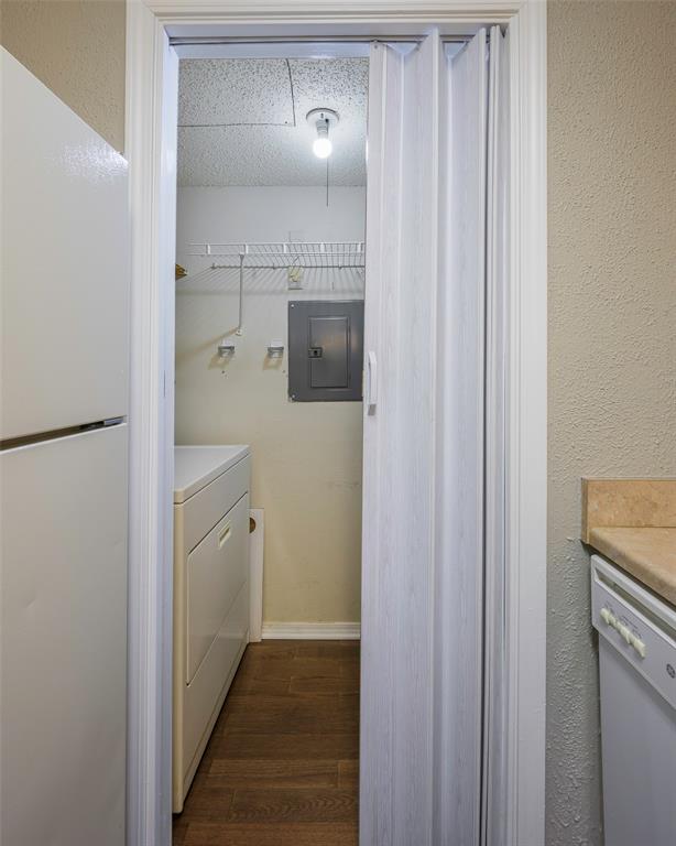 18333 Roehampton Drive, Unit 1412 Dallas, TX 75252 - Photo 9 of 14 a bathroom with a granite countertop sink and a mirror