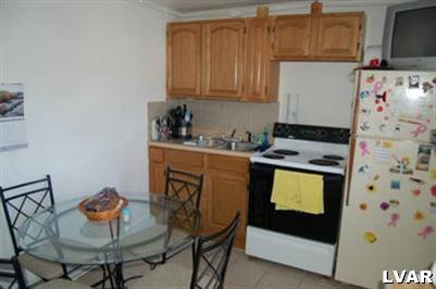 128 South 12th Street Allentown, PA 18102 - Photo 14 of 19 a utility room with dryer and washer