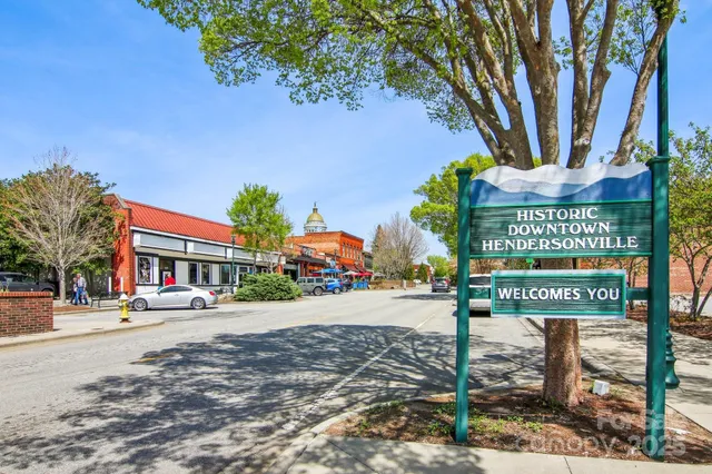 a street sign on a pole on a street