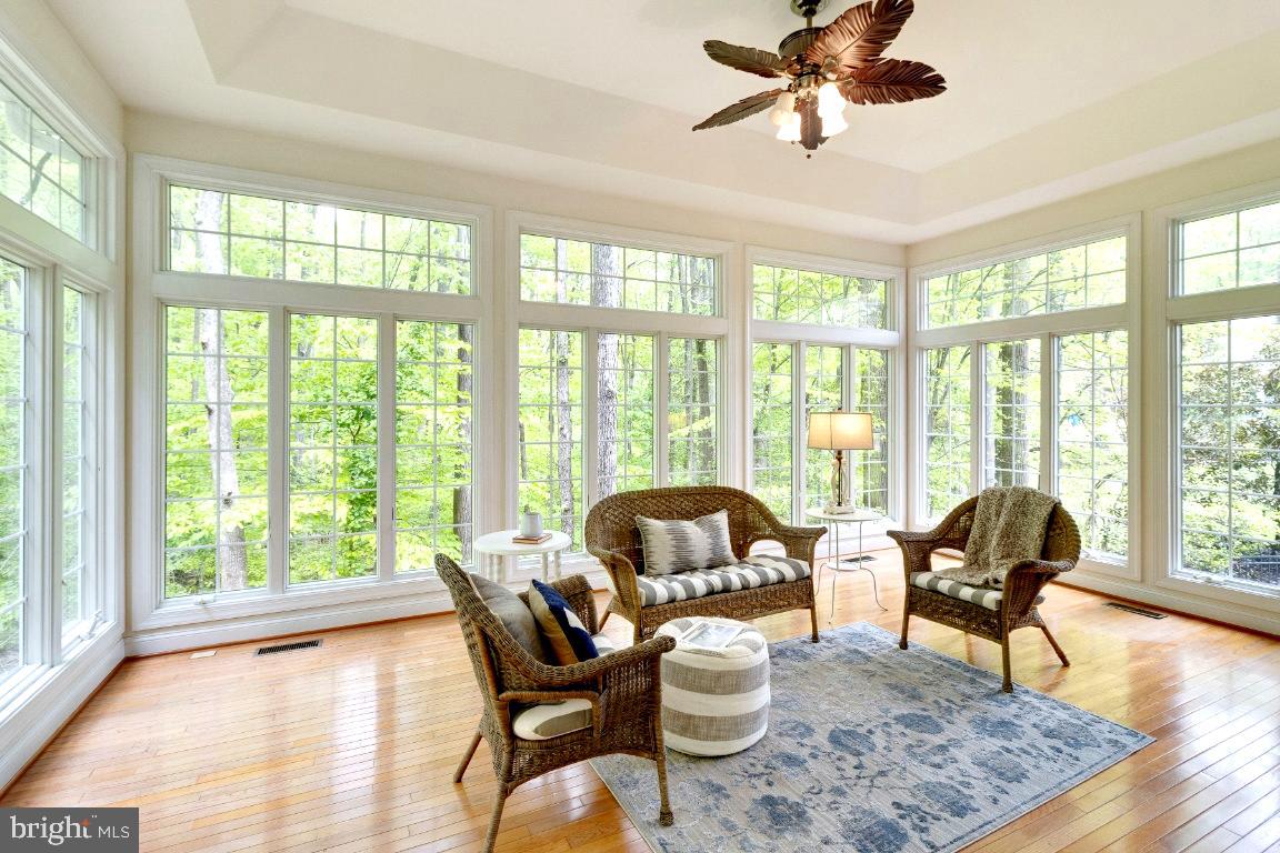 1602 Rabbit Foot Clover Court Annapolis, MD 21401 - Photo 19 of 59 Step into Window-Encased Sunroom