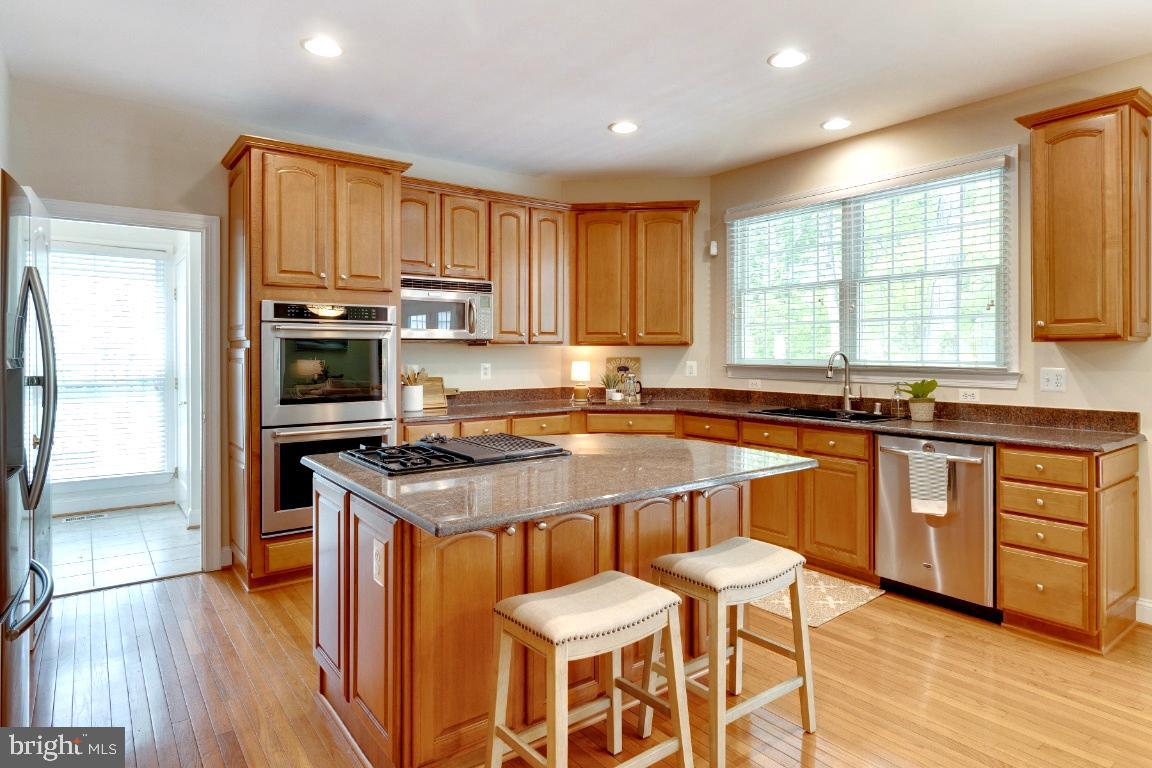 1602 Rabbit Foot Clover Court Annapolis, MD 21401 - Photo 30 of 59 Cooktop Island / Dining Bar