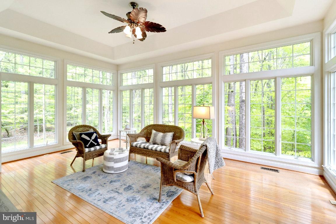 1602 Rabbit Foot Clover Court Annapolis, MD 21401 - Photo 7 of 59 Walls of Windows Inviting Nature Indoors