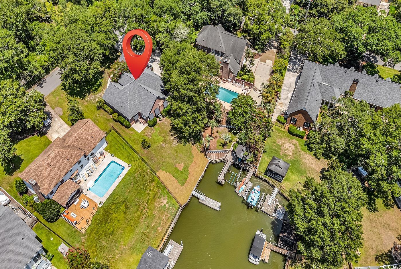 598 Rum Gully Road Murrells Inlet, SC 29576 - Photo 54 of 54 Drone / aerial view of a pool and a large body of water