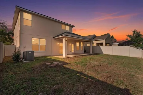 a house with trees in front of it
