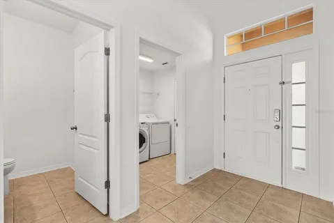 a view of a bathroom with a sink and mirror