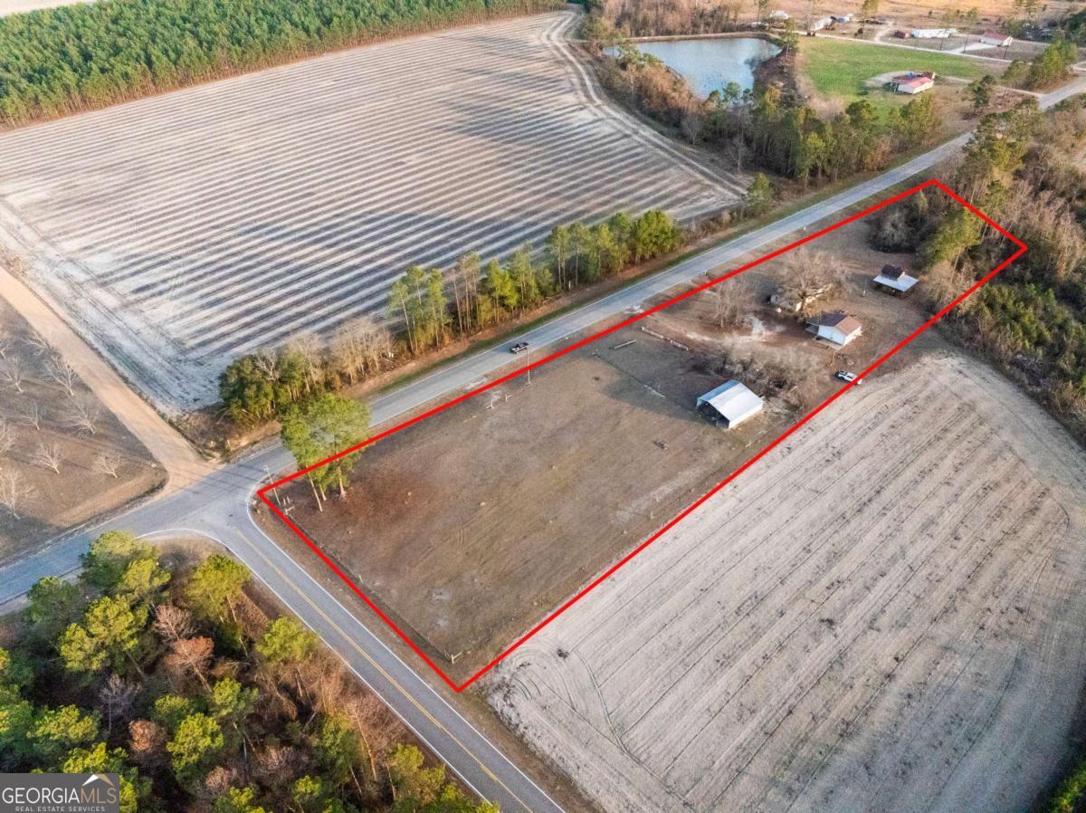 1092 Red Oak Road Baxley, GA 31513 - Photo 1 of 1 a view of a back yard of the house