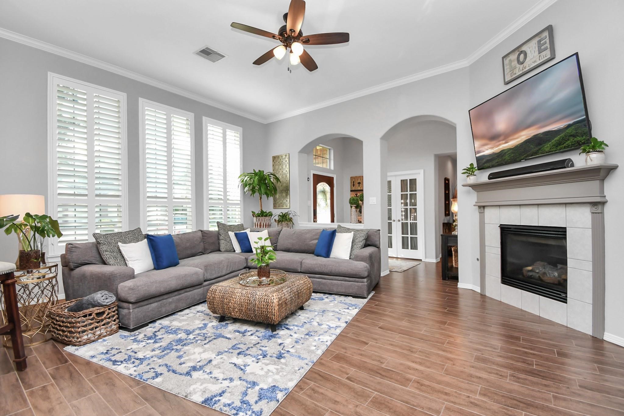 8624 Sunset Loch Drive Spring, TX 77379 - Photo 3 of 44 a living room with furniture fireplace and window