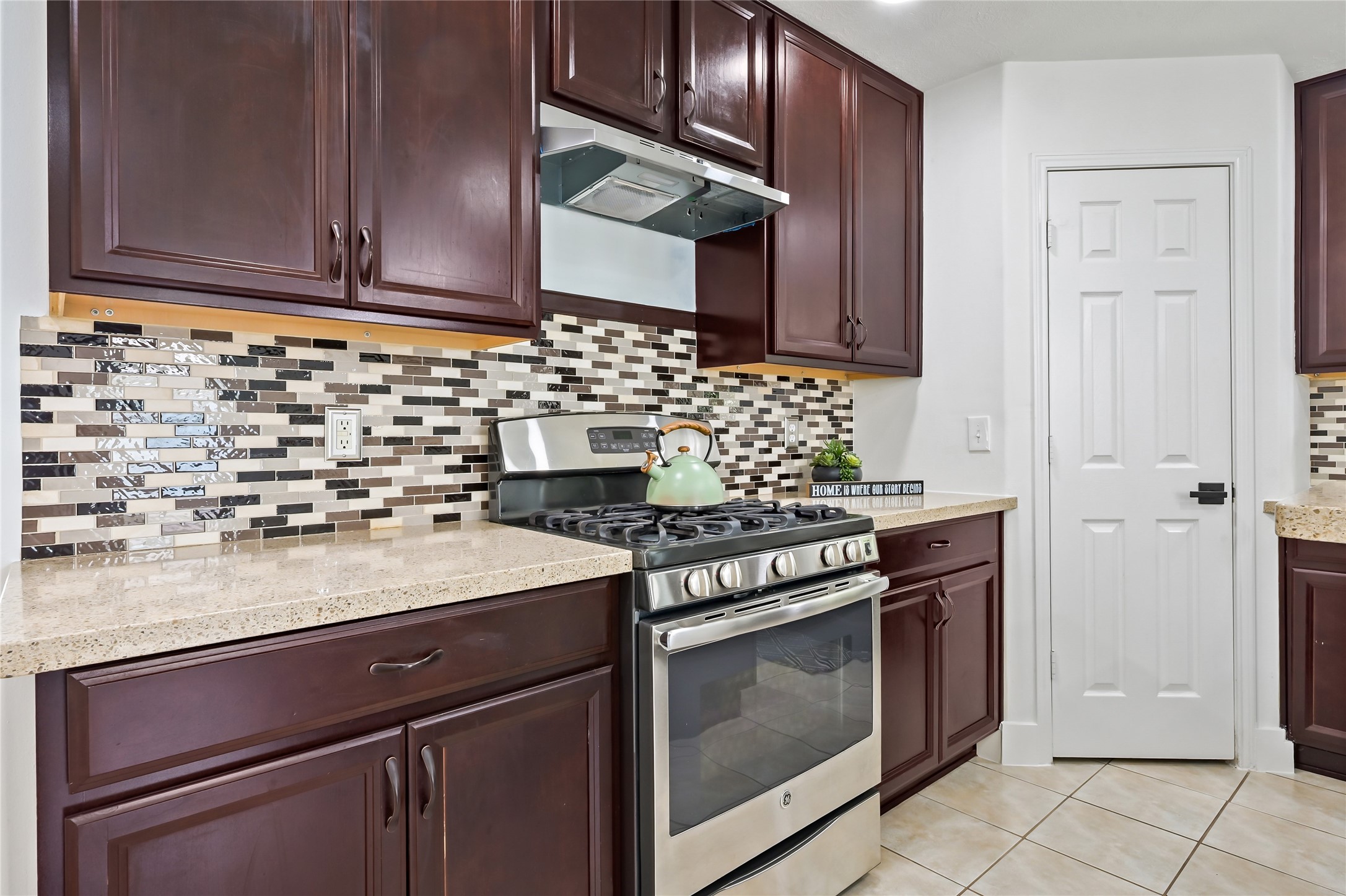 23311 Leafstone Lane Spring, TX 77373 - Photo 10 of 35 Plenty of cabinetry offers ample storage space, enhancing kitchen organization and style.