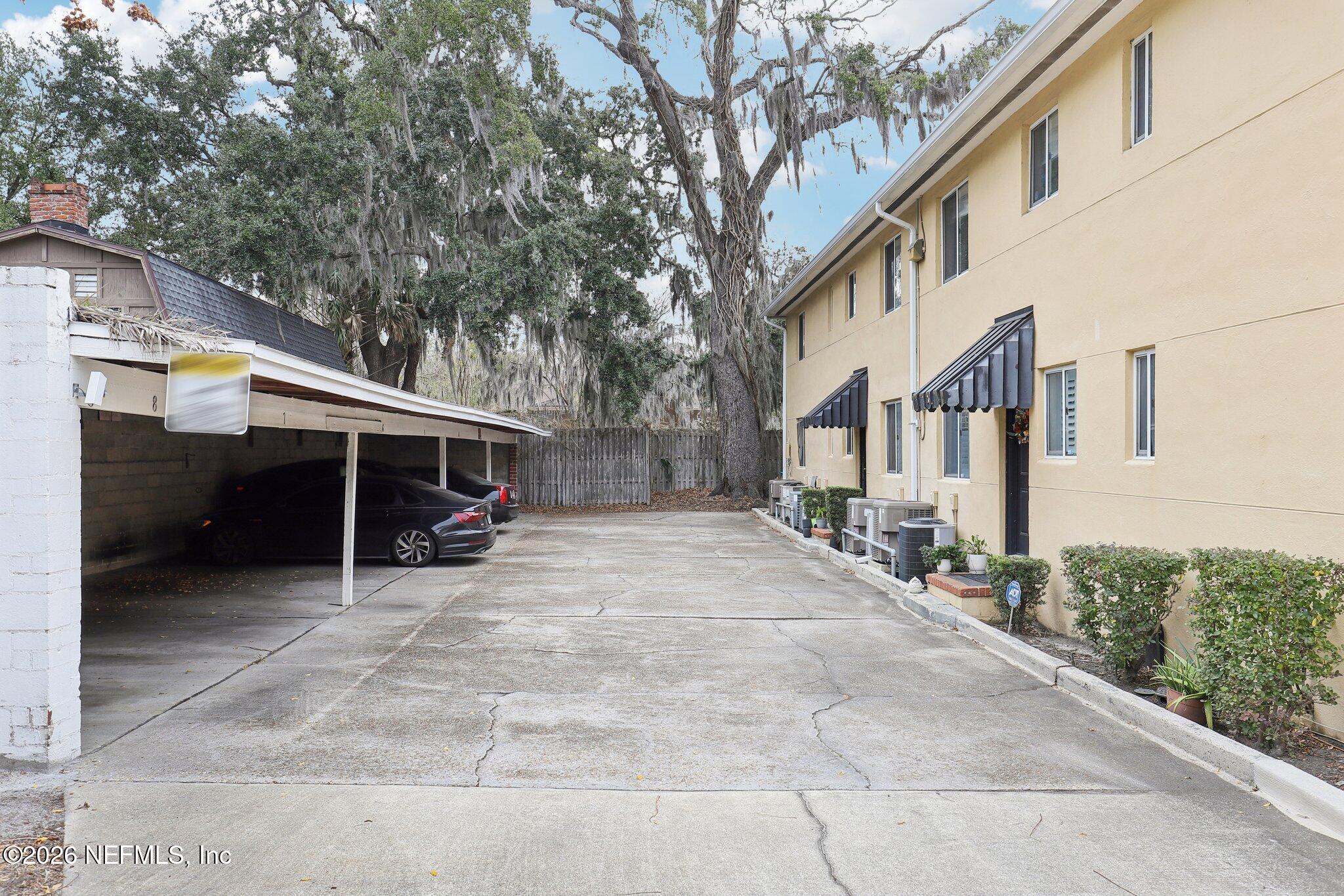 2159 Riverside Avenue, Unit 4 Jacksonville, FL 32204 - Photo 29 of 50 a view of a house with a yard and garage