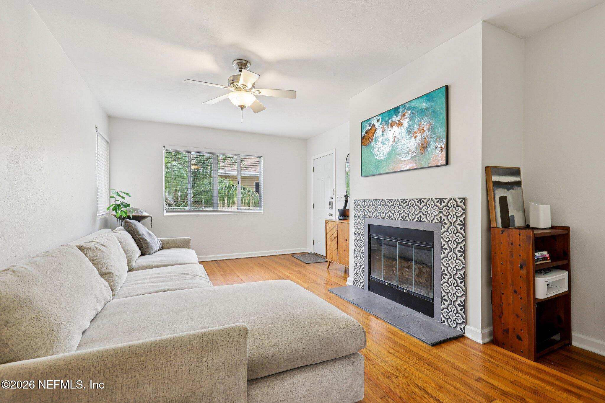 2159 Riverside Avenue, Unit 4 Jacksonville, FL 32204 - Photo 3 of 50 a living room with furniture and a fireplace