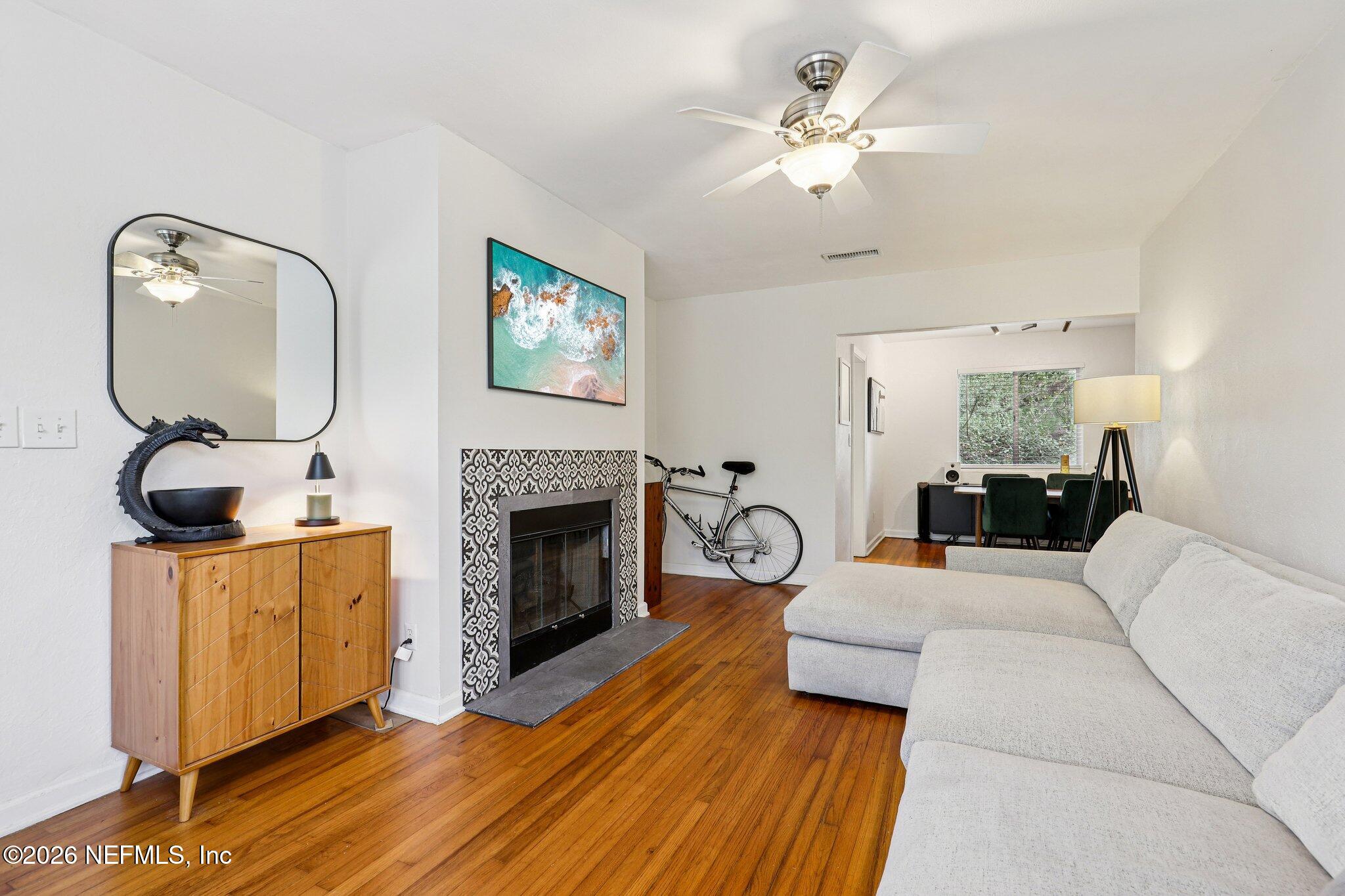 2159 Riverside Avenue, Unit 4 Jacksonville, FL 32204 - Photo 5 of 50 a living room with furniture and a fireplace