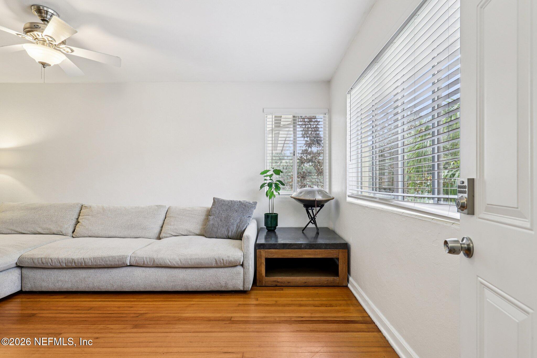 2159 Riverside Avenue, Unit 4 Jacksonville, FL 32204 - Photo 9 of 50 a living room with furniture and a rug