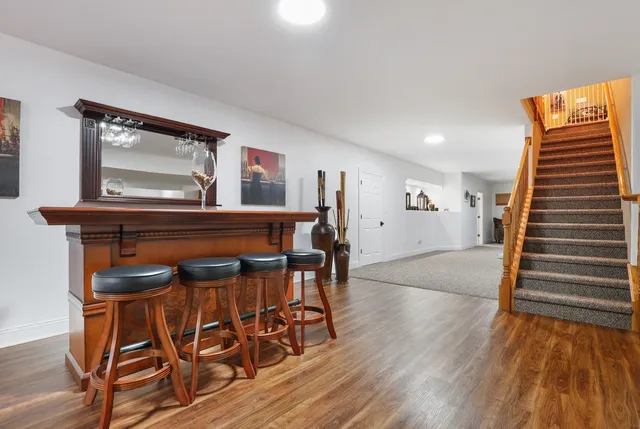 a view of a livingroom with furniture and wooden floor