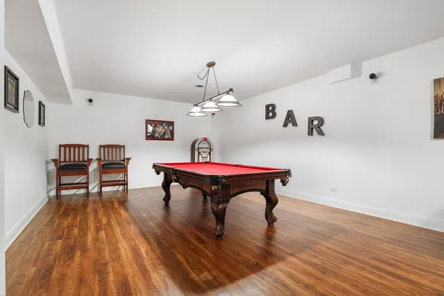 a room with furniture and wooden floor