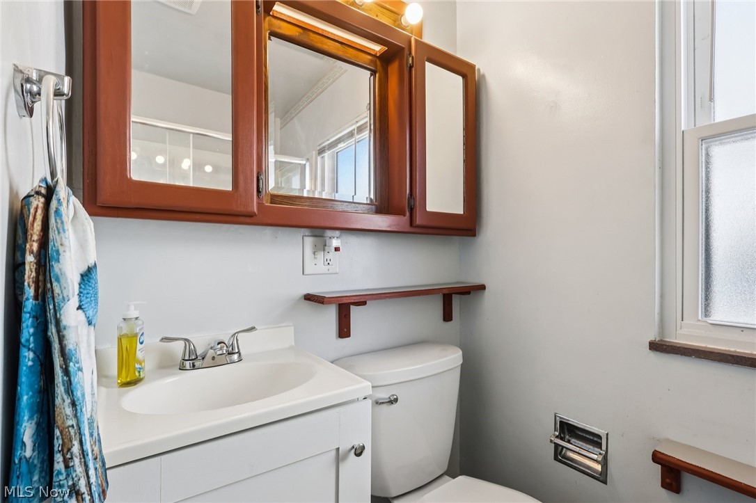 4252 Ridgeview Road Cleveland, OH 44144 - Photo 11 of 37 Half bath featuring vanity and toilet