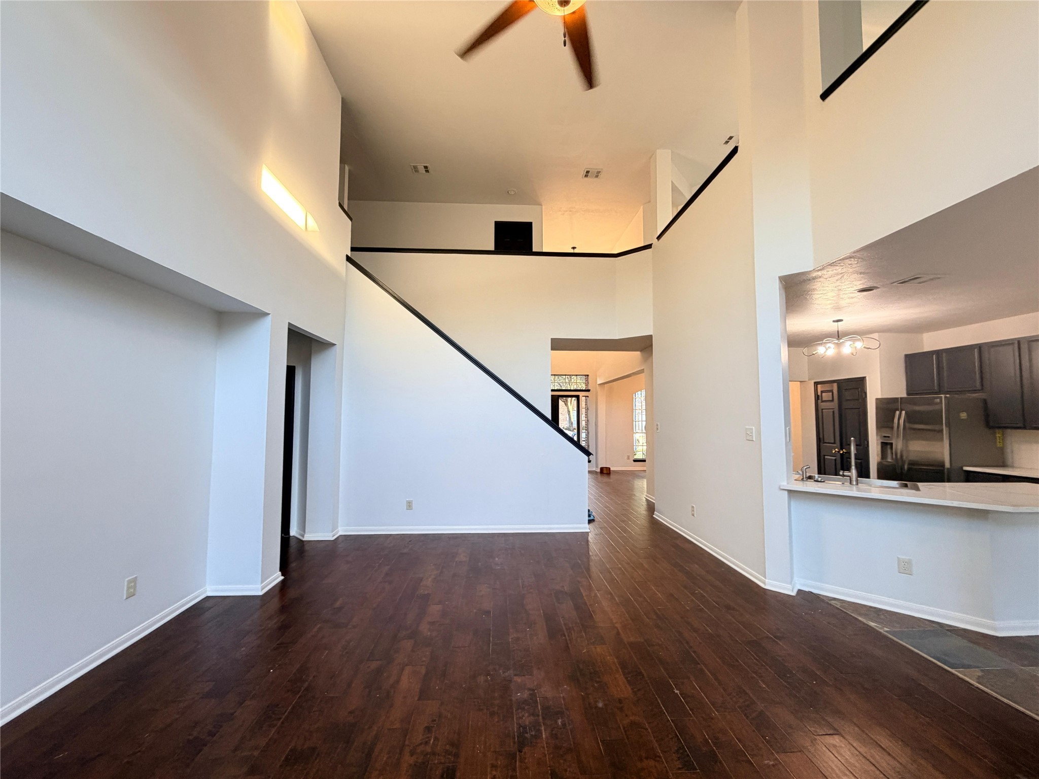 13002 Bainbridge Trail Houston, TX 77065 - Photo 11 of 32 a view of entryway and hall with wooden floor