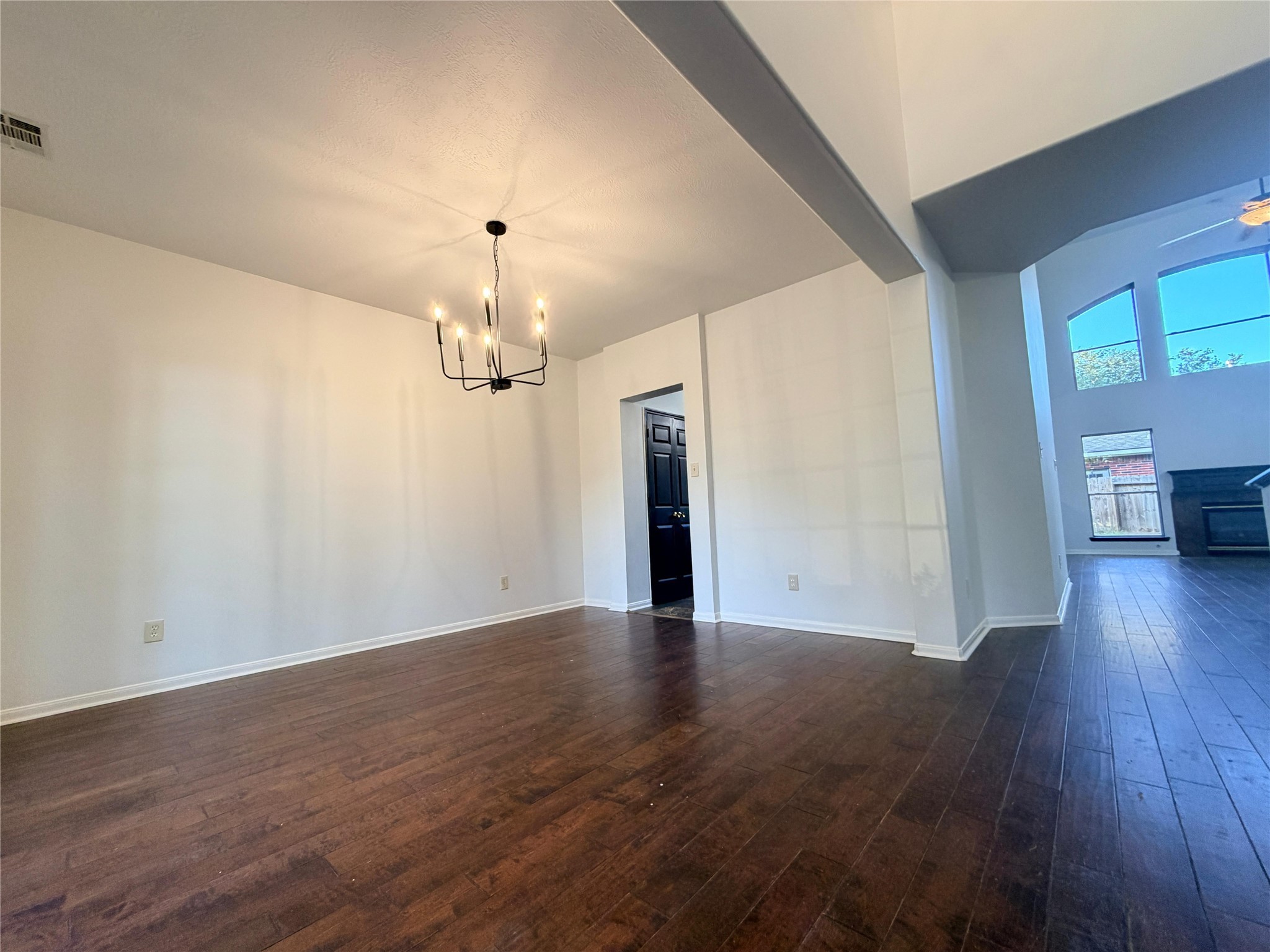 13002 Bainbridge Trail Houston, TX 77065 - Photo 17 of 32 wooden floor in an empty room with a window