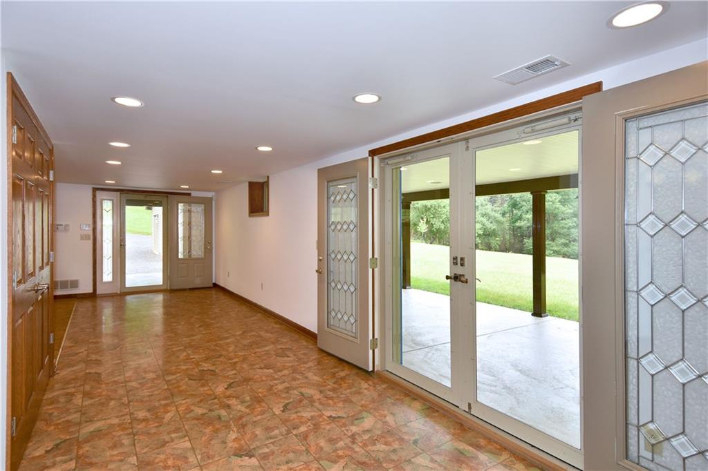 1585 Bellmonte Road Pittsburgh, PA 15237 - Photo 15 of 24 The lower level has 2 doors to the over sized patio and tons of recessed lighting.