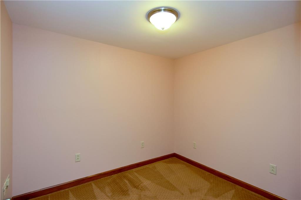 1585 Bellmonte Road Pittsburgh, PA 15237 - Photo 17 of 24 This additional room in the lower level is a perfect den or exercise room.