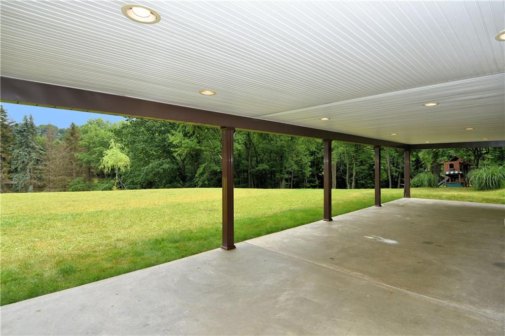 1585 Bellmonte Road Pittsburgh, PA 15237 - Photo 18 of 24 Wonderful covered patio expands your entertaining space and has beautiful views of the large back yard.
