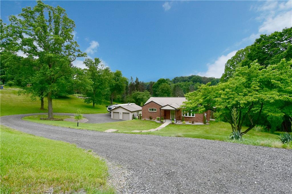1585 Bellmonte Road Pittsburgh, PA 15237 - Photo 24 of 24 Incredible sweeping crushed asphalt driveway with water drainage system. New upgraded electric and gas utilities from the street.