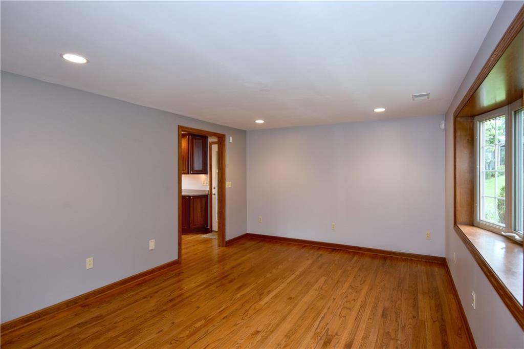 1585 Bellmonte Road Pittsburgh, PA 15237 - Photo 5 of 24 Another view of Living/Dining room - professionally installed hard-wired security, Smoke, Fire, Heat, Carbon Monoxide and Natural Gas Monitoring.
