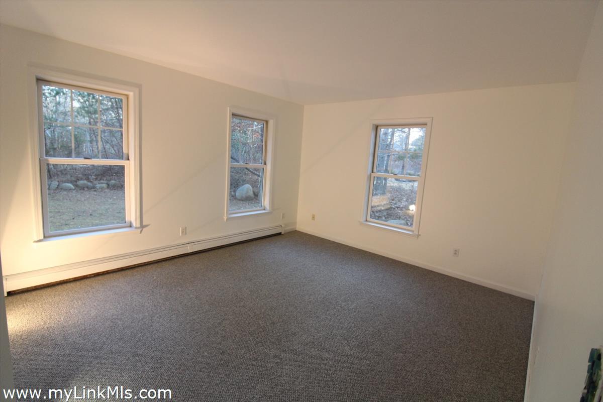 11 Flamingo Drive Edgartown, MA 02539 - Photo 13 of 25 an empty room with windows
