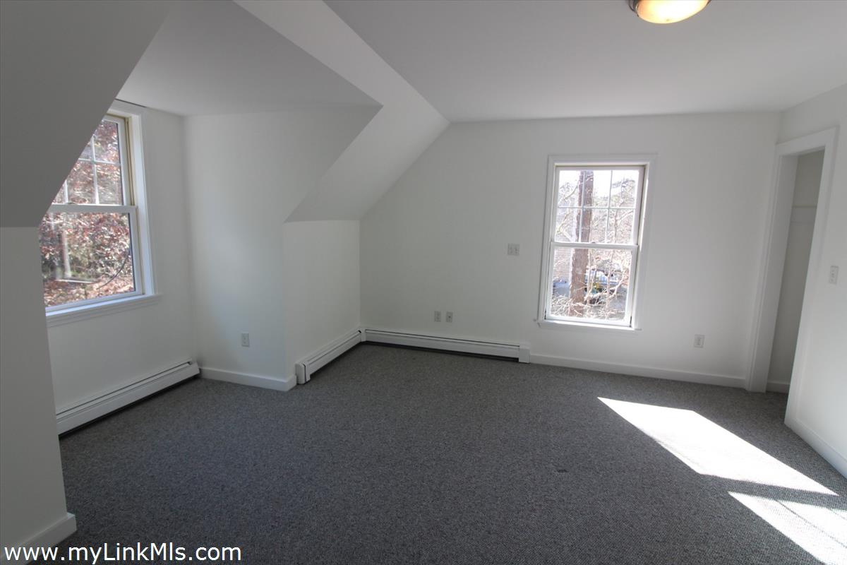 11 Flamingo Drive Edgartown, MA 02539 - Photo 15 of 25 an empty room with windows