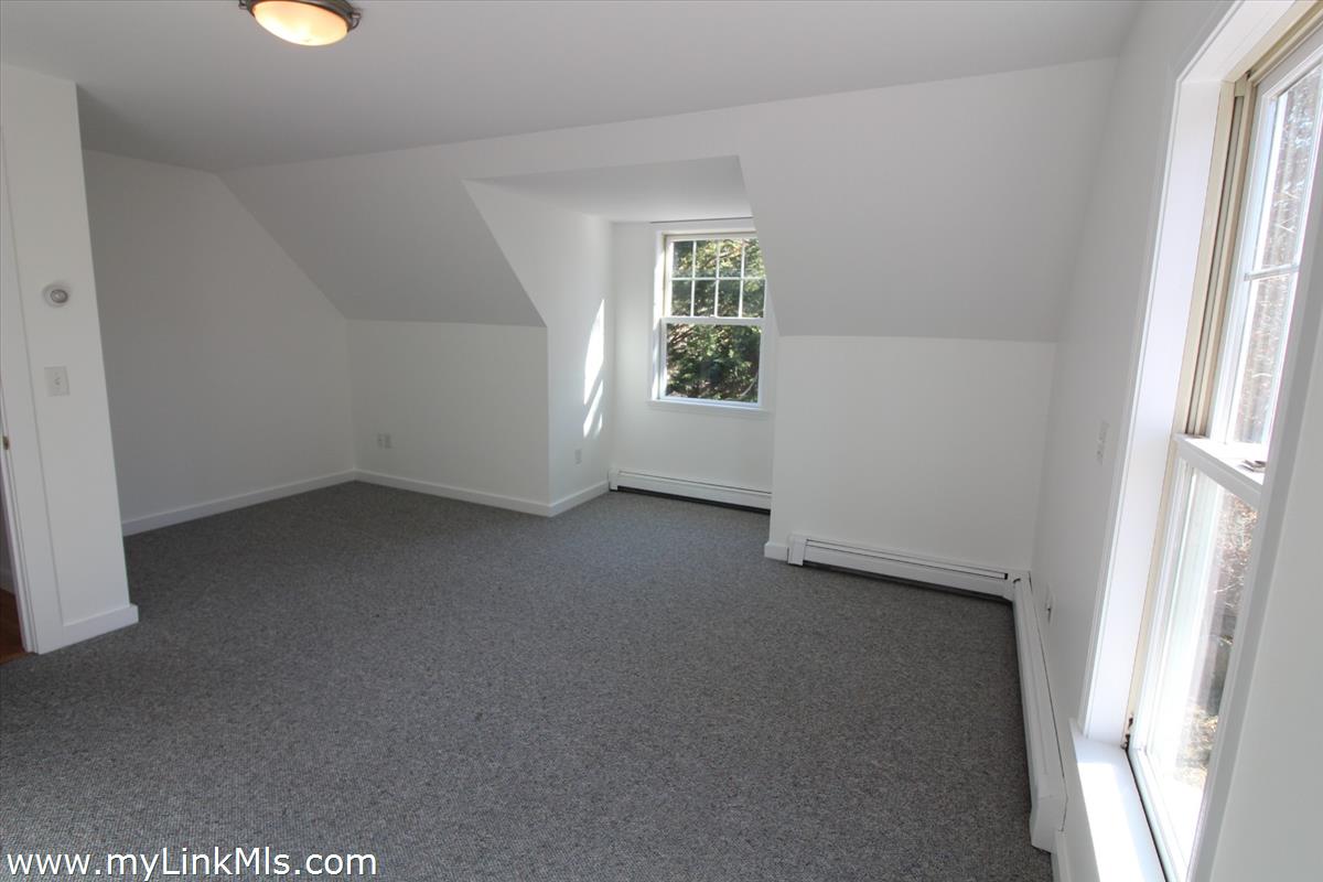 11 Flamingo Drive Edgartown, MA 02539 - Photo 16 of 25 an empty room with windows