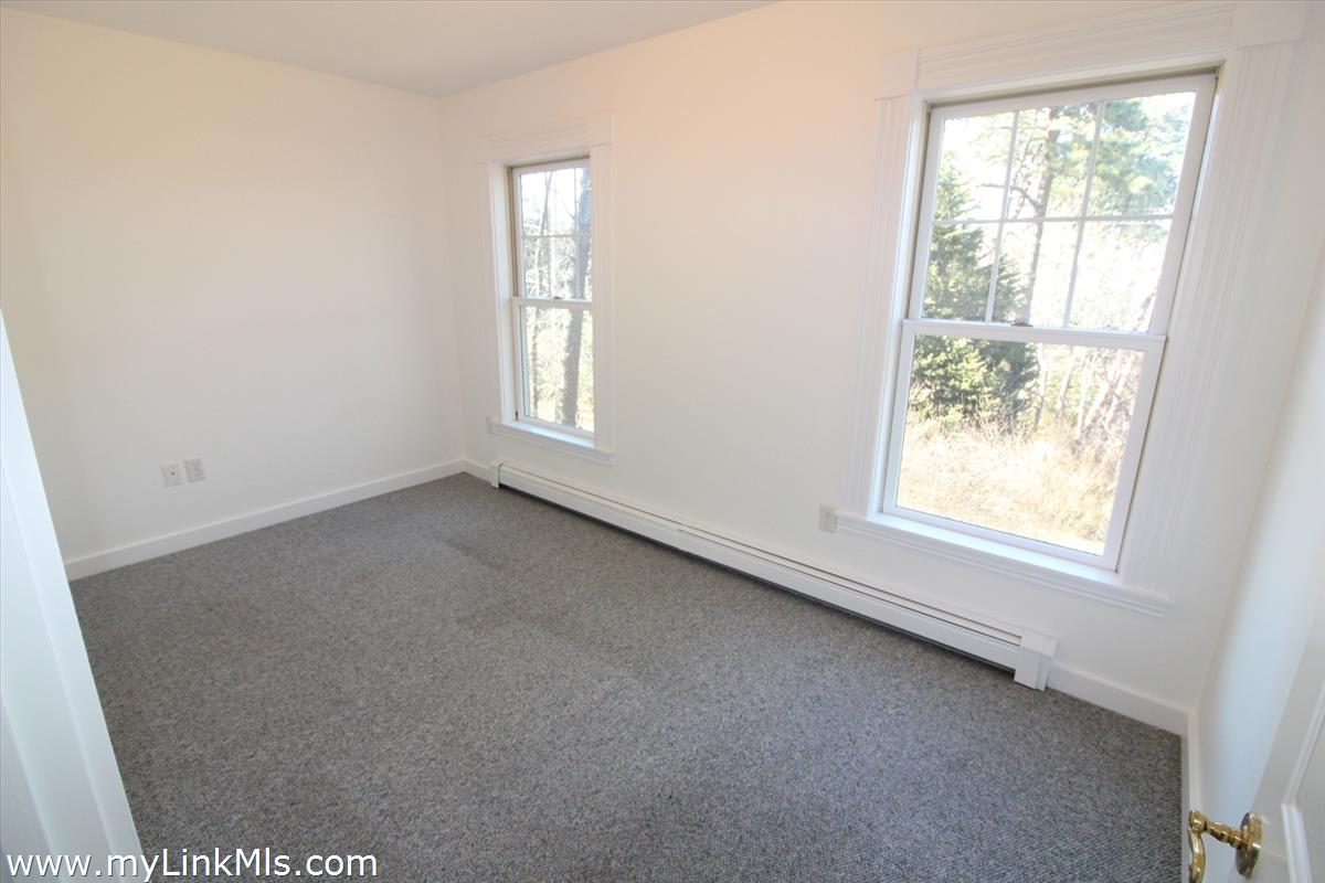 11 Flamingo Drive Edgartown, MA 02539 - Photo 20 of 25 an empty room with a window