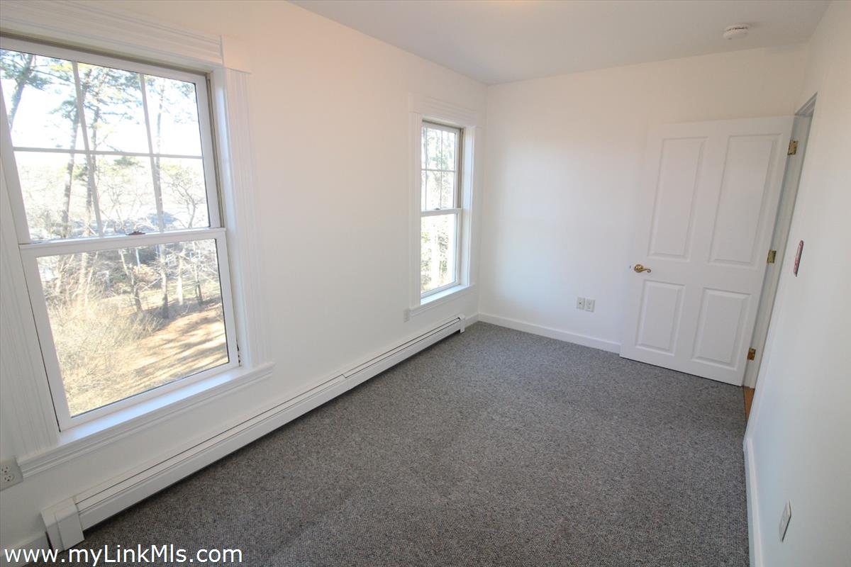 11 Flamingo Drive Edgartown, MA 02539 - Photo 21 of 25 a view of empty room with windows