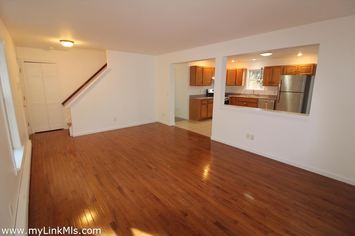 11 Flamingo Drive Edgartown, MA 02539 - Photo 5 of 25 a view of a kitchen with a sink and wooden floor