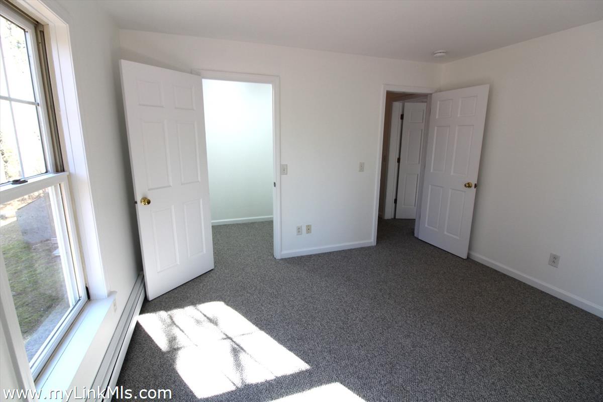 11 Flamingo Drive Edgartown, MA 02539 - Photo 10 of 25 a view of an empty room and a window