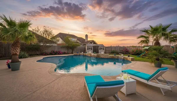 a view of a lake with couches and city view