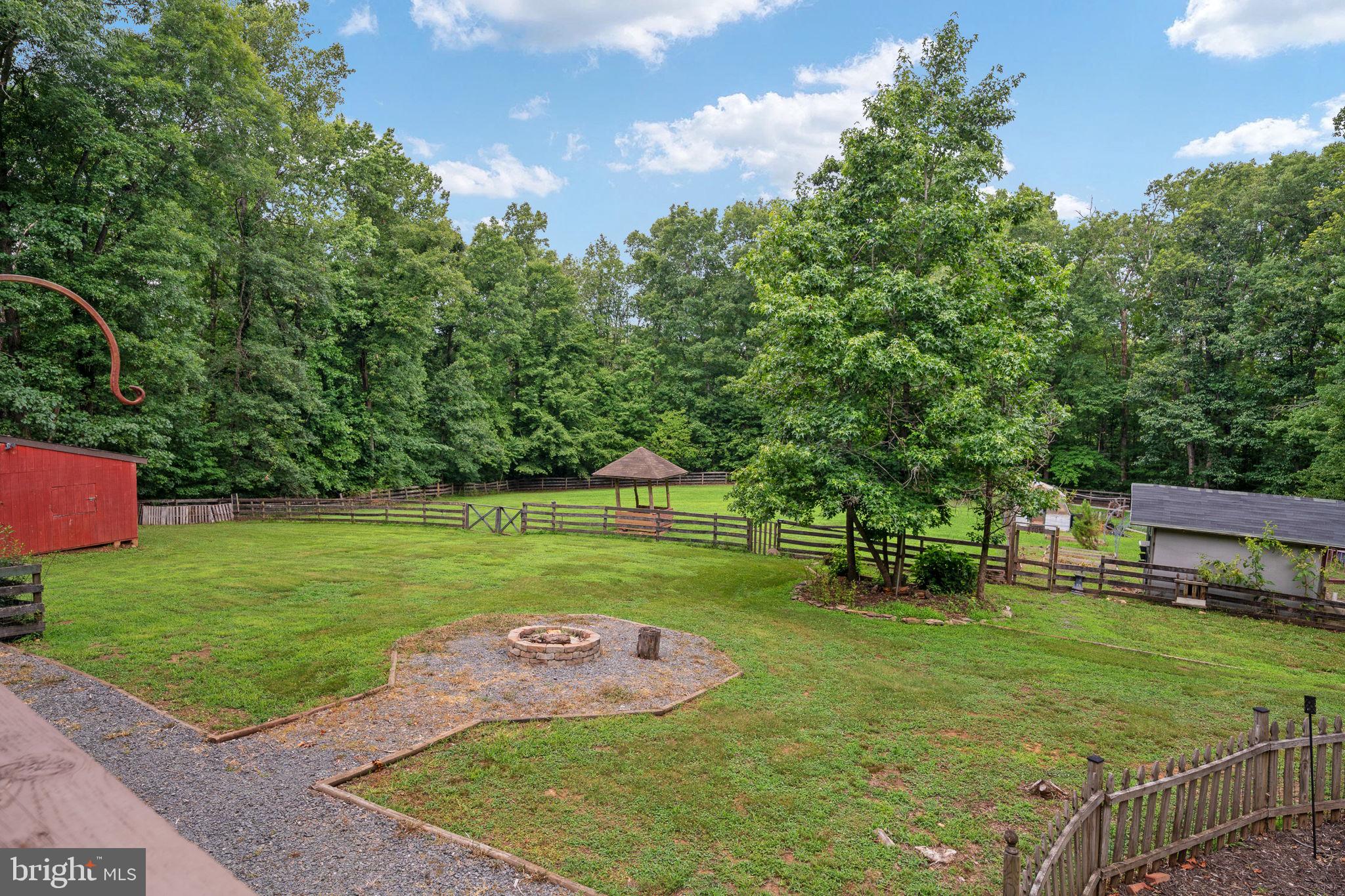 60 River Falls Road Fredericksburg, VA 22406 - Photo 64 of 73 Fire pit, chicken coop, raised garden beds!